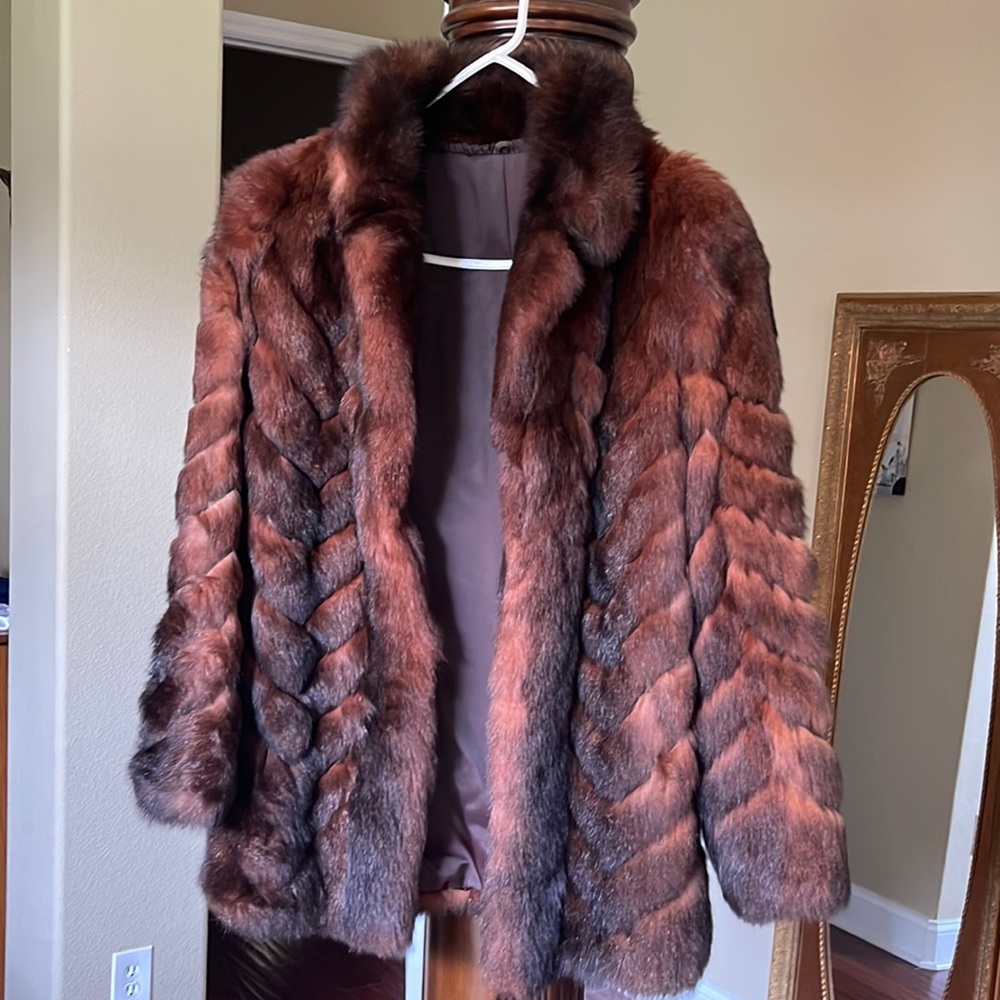 Real fox fur coat. Excellent condition. Worn a few times only.